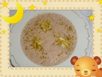 Schokoladensuppe mit Schneeklösschen und Pistazien - Rezept