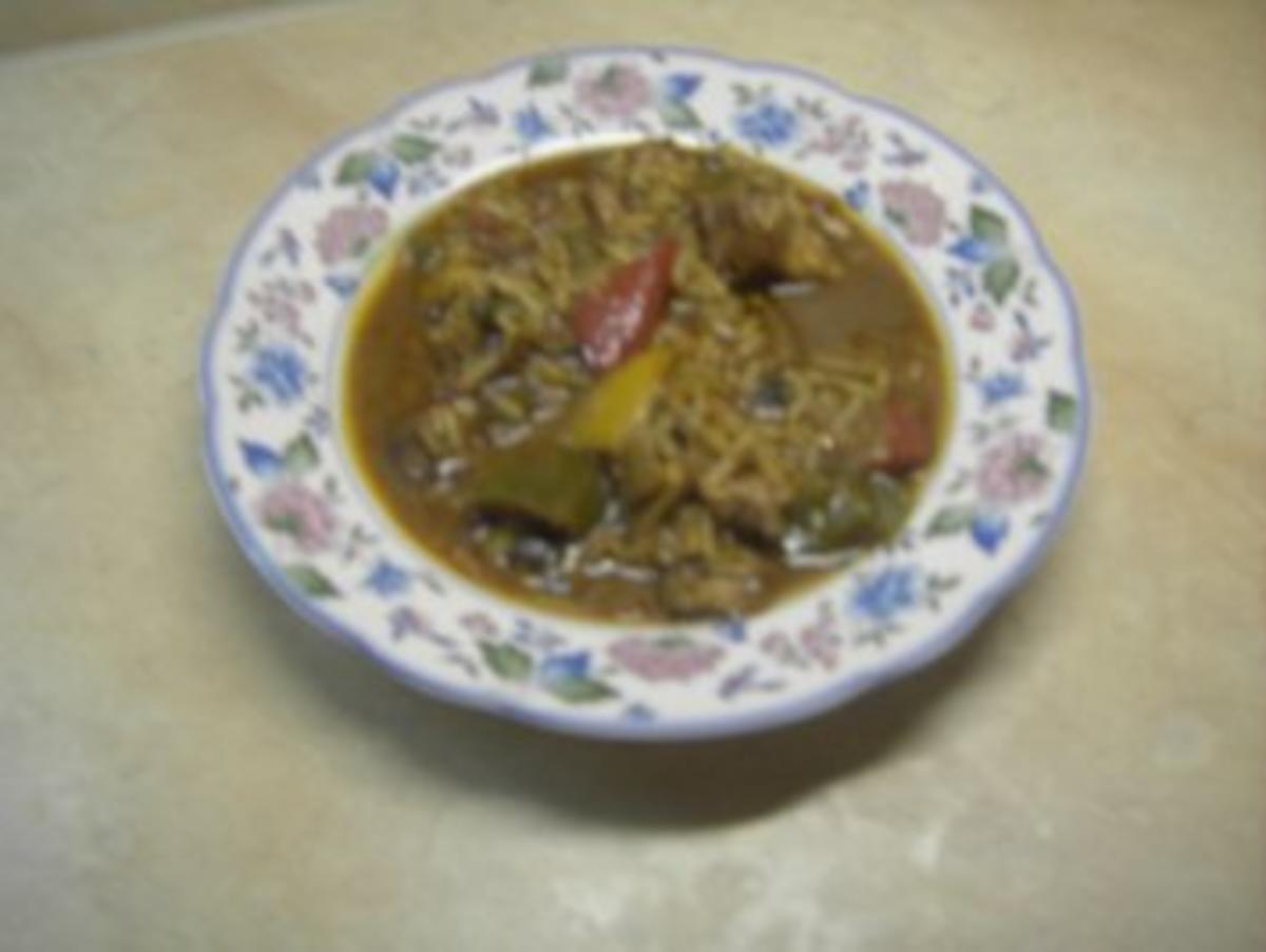 Suppen - Eintöpfe - Kaninchen-Kalbs-Stew mit Reis und Salsiccia - Rezept