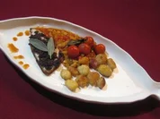 Dorade unter Olivenkruste mit ligurischem Gemüse und Gnocchi - Rezept - Bild Nr. 2