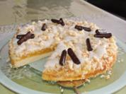 Zitronenkuchen mit Orangenpuddingfüllung - Rezept
