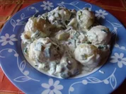Knödel mit Lauchzwiebel-Specksoße - Rezept