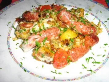 Merquez mit Kartöffelchen gebraten und mit Mozzarella überbacken - Rezept