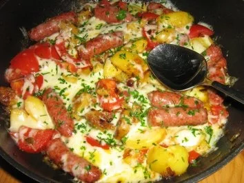 Merquez mit Kartöffelchen gebraten und mit Mozzarella überbacken - Rezept - Bild Nr. 6