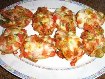 Baguette mit Kräuterbutter und Bruscetta lecker überbacken - Rezept - Bild Nr. 6