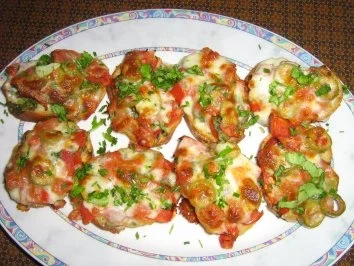 Baguette mit Kräuterbutter und Bruscetta lecker überbacken - Rezept - Bild Nr. 7