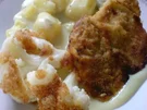 Schnitzel mit Blumenkohl und heller Soße - Rezept