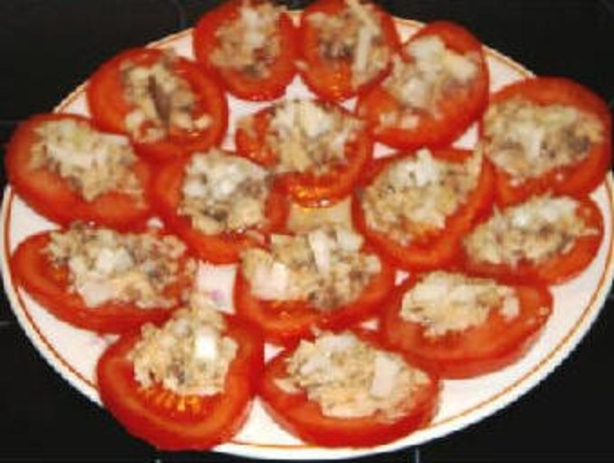 Überbackene Tomaten mit Thunfisch - Rezept