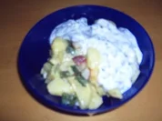 Kartoffelsalat mit Radieschen und Lauchzwiebeln und Joghurtdressing - Rezept