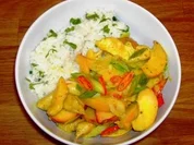 Scharfes Pfirsich-Hähnchenbrustgeschnetzeltes mit Zitronen-Butter-Reis - Rezept