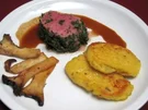 Pochiertes Kalbsfilet im Kräutermantel an Kartoffel-Blini und Kräuterseitlingen - Rezept