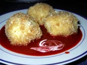 Tonka-Griesklöße auf Himbeerspiegel - Rezept