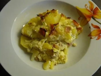 Kartoffelauflauf mit Fetacreme und Schinken - Rezept
