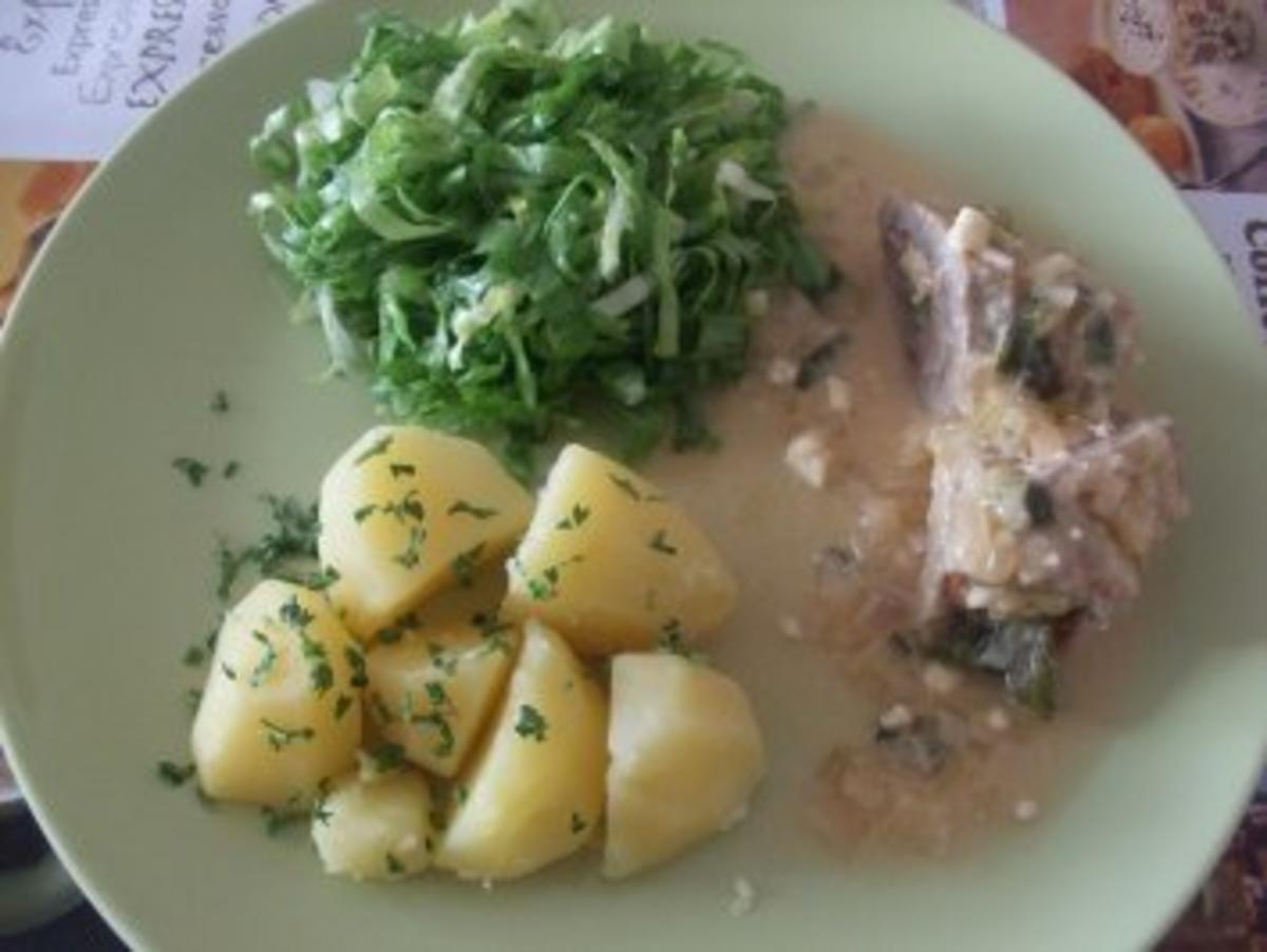 Bilder für Schnitzelröllchen mit Zwiebel Sößchen - Rezept