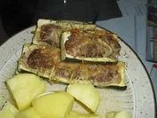 Rezept: Gratinierte Zuccini mit lecker Hackfleischfüllung Gratinierte Zuccini mit lecker Hackfleischfüllung - Rezept