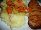 Backfisch mit Möhren-Lauch-Gemüse im Kartoffelnest - Rezept