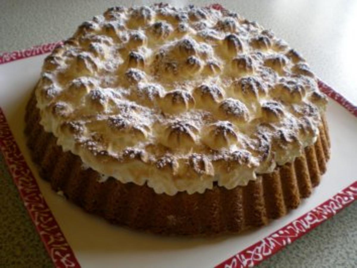 Bilder für Amaretti Kuchen mit Heidelbeeren und Schneehäubchen - Rezept