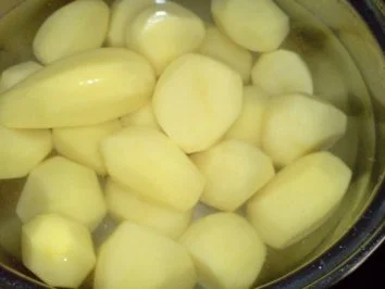 Rezept: Putenschnitzel im Kokosmantel Bild Nr. 3 Putenschnitzel im Kokosmantel - Rezept - Bild Nr. 3