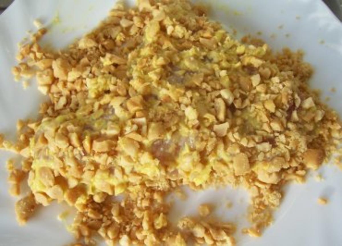 Kochen: Putenschnitzel mit Erdnusskruste - Rezept - kochbar.de