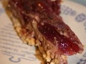 Kirschen auf Vanillie-Schoko-Puddingkissen in Mandelteigbett - Rezept