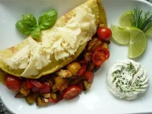 Rezept: Currykraut-Pfannkuchen mit knackiger Gemüsefüllung und Tete de Moine-Locken Currykraut-Pfannkuchen mit knackiger Gemüsefüllung und Tete de Moine-Locken - Rezept