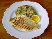 Erbsen-Speck-Risotto mit Pangasiusfilet - Rezept