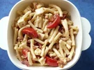 Nudelsalat mit Speck und Tomaten - Rezept