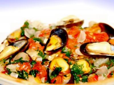 Rezept: Piri-Piri-Schweinefleisch mit Muscheln (Porc Alentejano com Piri-Piri) aus Portugal Piri-Piri-Schweinefleisch mit Muscheln (Porc Alentejano com Piri-Piri) aus Portugal - Rezept