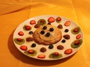 Früchteteller mit Schokoladenfrosch - Rezept