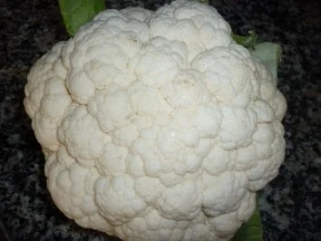 Pinienkern - Schnitzel an überbackenem Blumenkohl mit Schinkenwürfeln - Rezept - Bild Nr. 6