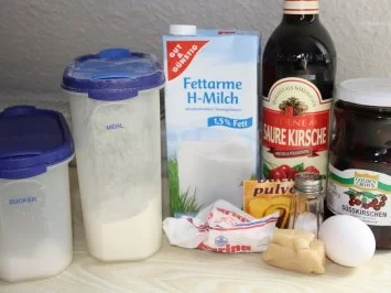 Rezept: Muffins: Kirsch-Marzipan-Häufchen Muffins: Kirsch-Marzipan-Häufchen - Rezept