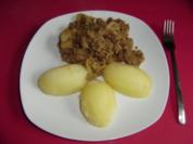 Gefülltes Kraut - Weißkohl läßt sich auf Hackfleisch ein... - Rezept