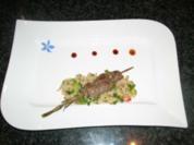 Arabischer Grießsalat an gebratenem Lammfilet auf Rosmarinspieß - Rezept