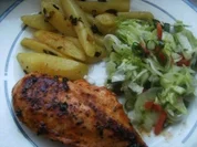 Hähnchenbrüstchen   mit -- in Frühlingszwiebel Butter geschwenkten Kartoffelspalten - Rezept