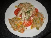 Knoblauchhuhnstreifen auf Tomate mit Gemüsereis - Rezept