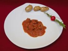 Dattel-Albondigas an scharfer Oliven-Tomatensoße mit Bratlingen (Kalle Pohl) - Rezept
