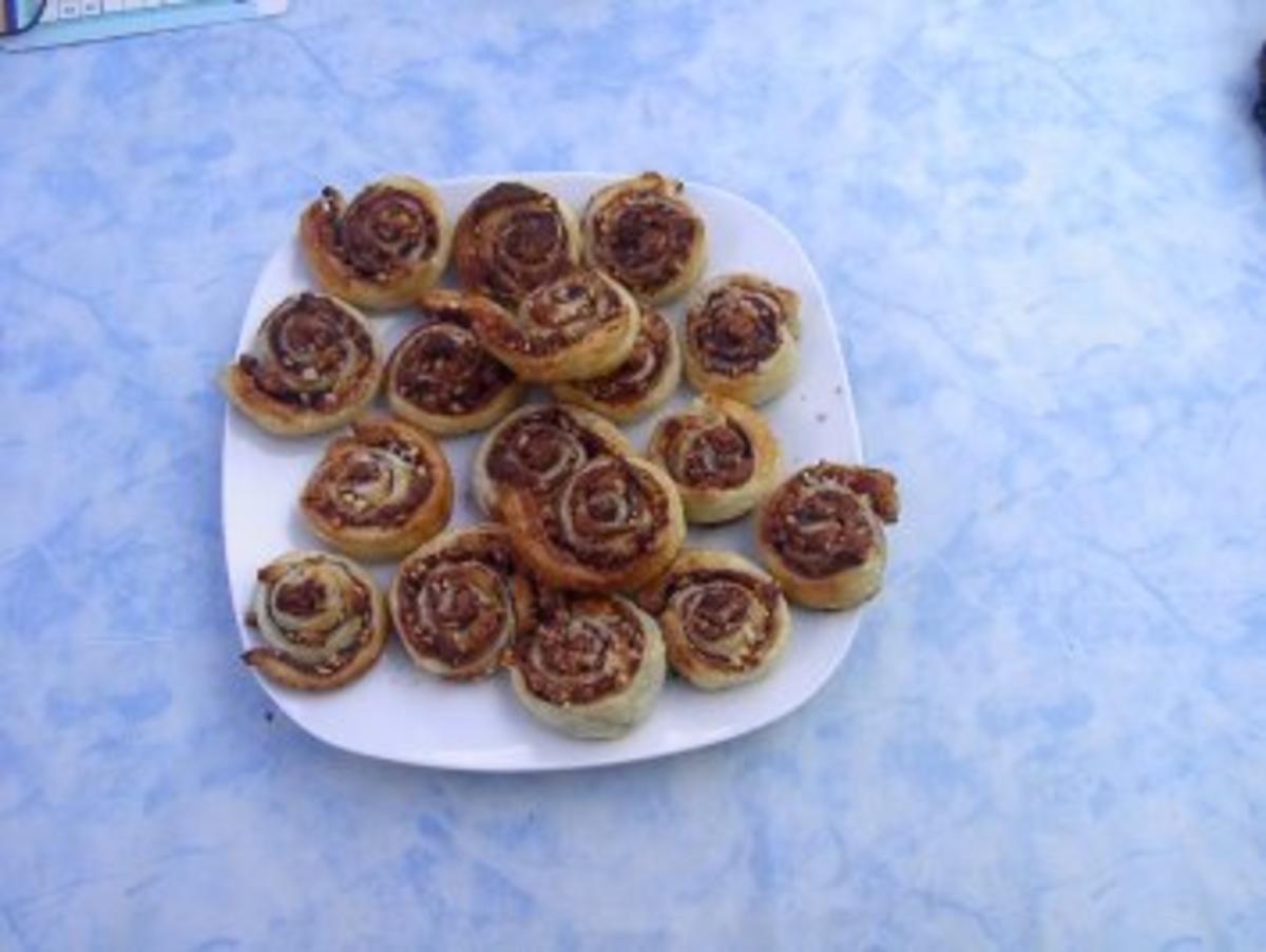 Bilder für Mandel - Marzipan - Schneckchen - Rezept