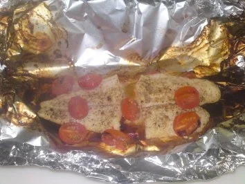 Gedünstetes Pangasiusfilet mit Tomaten - Rezept