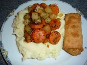 "Flühlingslolle" mit Kohlrabi-Möhren-Gemüse im Kartoffelnest - Rezept