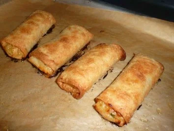 Rezept: "Flühlingslolle" mit Kohlrabi-Möhren-Gemüse im Kartoffelnest Bild Nr. 2 "Flühlingslolle" mit Kohlrabi-Möhren-Gemüse im Kartoffelnest - Rezept - Bild Nr. 2