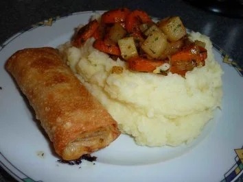 Rezept: "Flühlingslolle" mit Kohlrabi-Möhren-Gemüse im Kartoffelnest Bild Nr. 6 "Flühlingslolle" mit Kohlrabi-Möhren-Gemüse im Kartoffelnest - Rezept - Bild Nr. 6