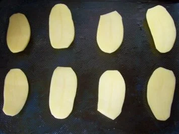 Rezept: Zwischensnack: Tomatige Ofen-Kartoffeln Bild Nr. 2 Zwischensnack: Tomatige Ofen-Kartoffeln - Rezept - Bild Nr. 2