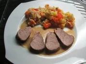 Schweinefilet auf Papaya-Ananas-Reis - Rezept
