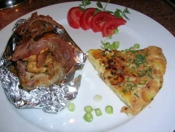 Rezept: Duroc (Eichel-)Schweinesteaks im Überraschungspäckchen mit Tortilla und Pfifferlingen Duroc (Eichel-)Schweinesteaks im Überraschungspäckchen mit Tortilla und Pfifferlingen - Rezept