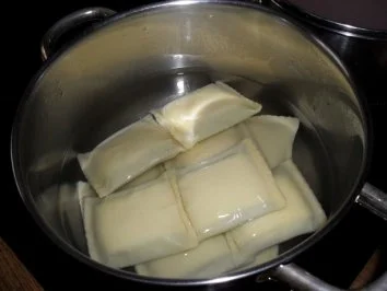 Maultaschen in Tomatensoße mit Schinken und Käse überbacken Bilder sind online - Rezept