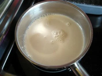 Rezept: Milchreis mit in Rum eingelegten Himbeeren Bild Nr. 4 Milchreis mit in Rum eingelegten Himbeeren - Rezept - Bild Nr. 4