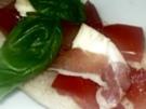 Knoblauchbrot mit Tomaten und Parmaschinken - Rezept