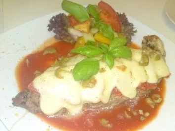 Schweinefleisch mit Tomaten und Mozzarella Überbacken - Rezept