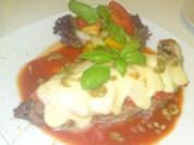 Schweinefleisch mit Tomaten und Mozzarella Überbacken - Rezept