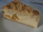 Streußel-Quarktorte mit einer Pfirsich-Füllung - Rezept