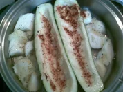 Zucchinischiffchen mit Eierfracht - Rezept